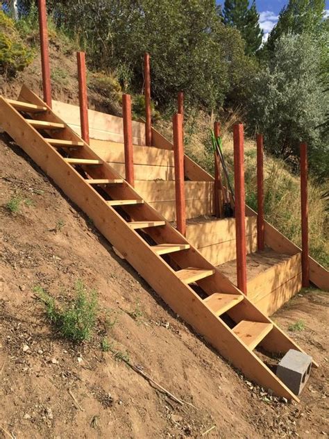 how to dig steps into a hillside with skid steer|diy hillside path.